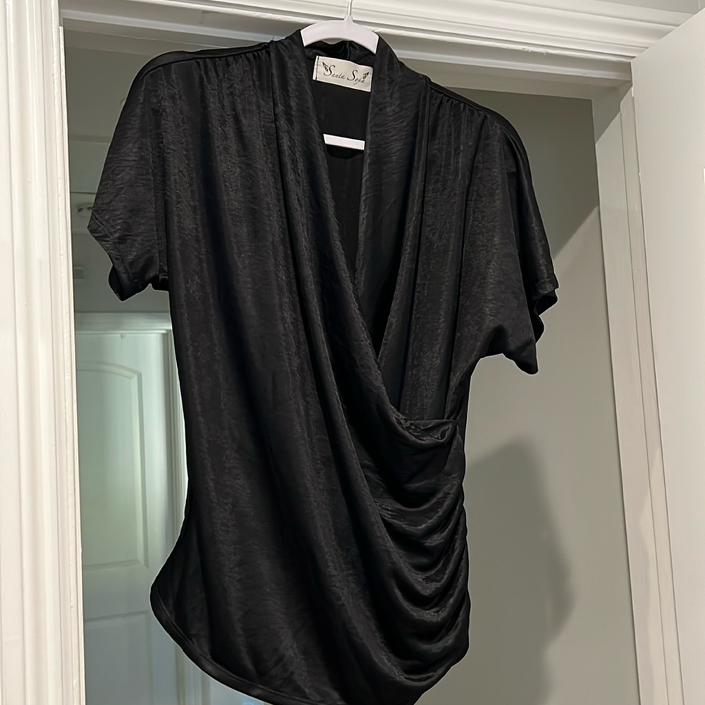 Flattering V-neck blouse.